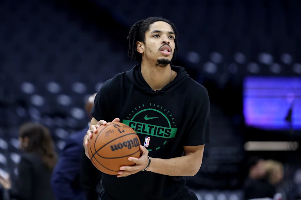 Jan 1, 2026; Sacramento, California, USA; Boston Celtics forward Josh Minott (8) warms up before the game against the Sacramento Kings at Golden 1 Center. Mandatory Credit: Dennis Lee-Imagn Images