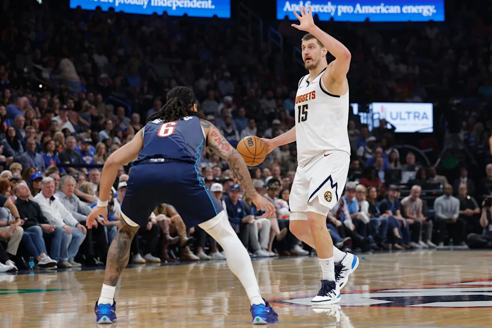 Feb 27, 2026; Oklahoma City, Oklahoma, USA; Denver Nuggets center Nikola Jokić (15) gestures to his team during a play against the Oklahoma City Thunder during the first quarter at Paycom Center. Mandatory Credit: Alonzo Adams-Imagn Images