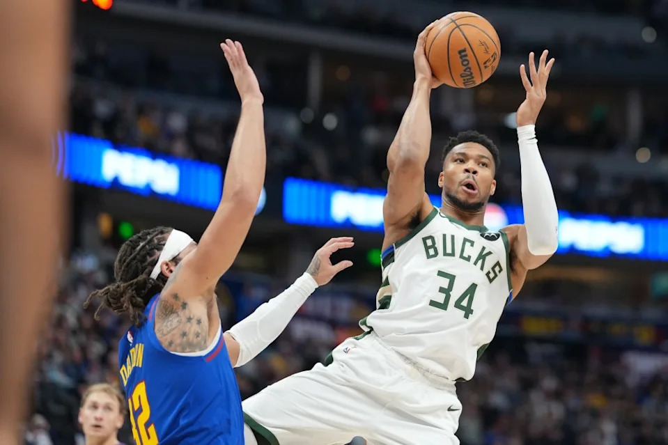 Giannis Antetokounmpo looks to pass the ball during the Bucks’ Jan. 11 game. AP