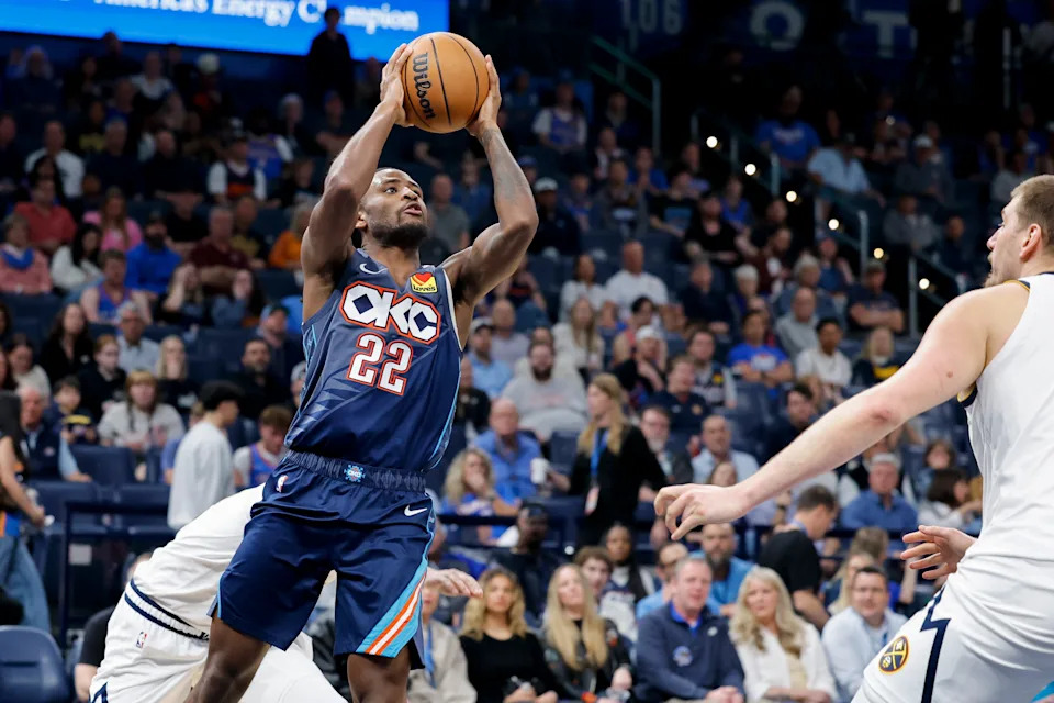 Feb 27, 2026; Oklahoma City, Oklahoma, USA; Oklahoma City Thunder guard Cason Wallace (22) goes up for a basket against the Denver Nuggets during the third quarter at Paycom Center. Mandatory Credit: Alonzo Adams-Imagn Images
