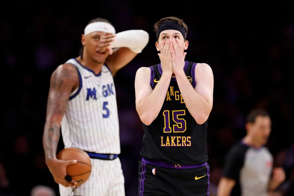 Los Angeles Lakers guard Austin Reaves reacts after fouling Orlando Magic forward Paolo Banchero (5) during the second half of an NBA basketball game Tuesday, Feb. 24, 2026, in Los Angeles. AP
