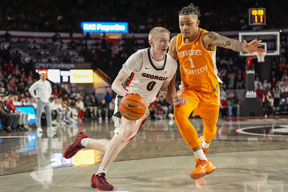 Jan 28, 2026; Athens, Georgia, USA; Georgia Bulldogs guard Blue Cain (0) dribbles against Tennessee Volunteers guard Amari Evans (1) at Stegeman Coliseum. Mandatory Credit: Dale Zanine-Imagn Images | Dale Zanine-Imagn Images