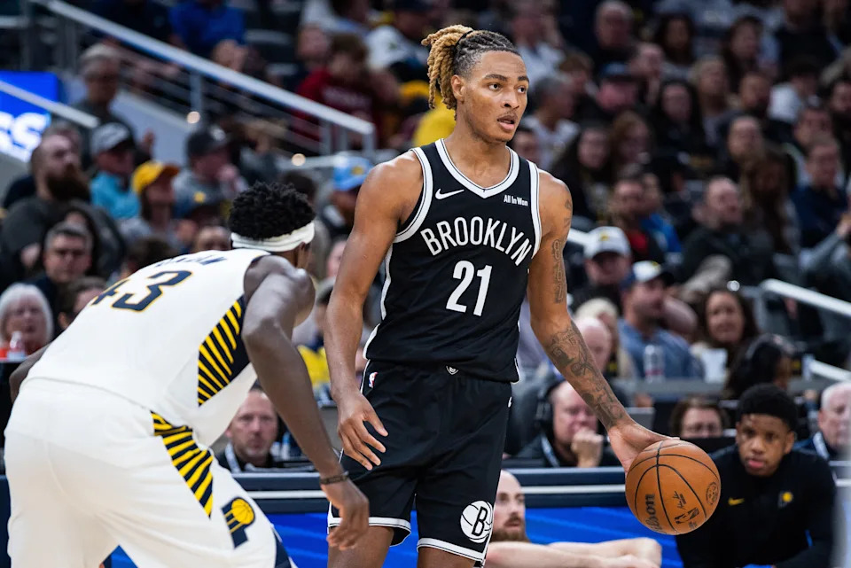 Nov 5, 2025; Indianapolis, Indiana, USA; Brooklyn Nets forward/center Noah Clowney (21) dribbles the ball while Indiana Pacers forward Pascal Siakam (43) defends in the second half at Gainbridge Fieldhouse. Mandatory Credit: Trevor Ruszkowski-Imagn Images