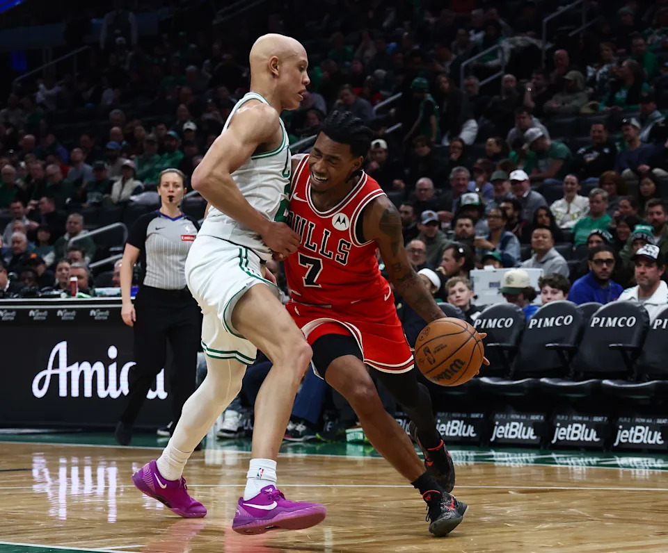Feb 11, 2026; Boston, Massachusetts, USA; Boston Celtics guard Jordan Walsh (27) tries to cut off Chicago Bulls guard Rob Dillingham (7) during the second half at TD Garden. Mandatory Credit: Winslow Townson-Imagn Images
