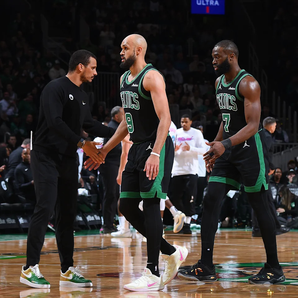 BOSTON, MA – APRIL 2: Head Coach Joe Mazzulla of the Boston Celtics high fives Derrick White #9 and Jaylen Brown #7 during the game against the Miami Heat on April 2, 2025 at TD Garden in Boston, Massachusetts. NOTE TO USER: User expressly acknowledges and agrees that, by downloading and/or using this Photograph, user is consenting to the terms and conditions of the Getty Images License Agreement. Mandatory Copyright Notice: Copyright 2025 NBAE(Photo by Brian Babineau/NBAE via Getty Images) | NBAE via Getty Images
