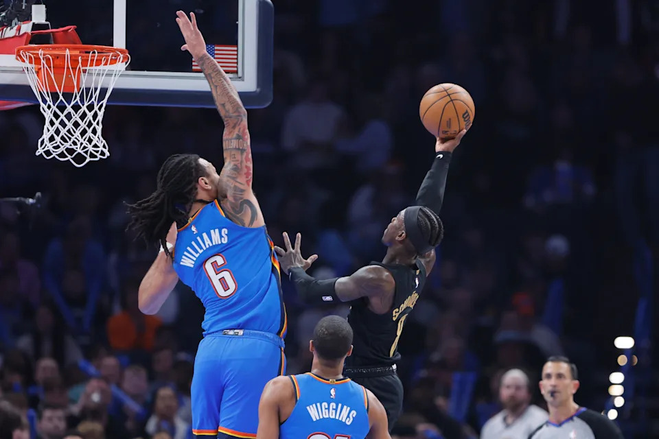 Feb 22, 2026; Oklahoma City, Oklahoma, USA; Cleveland Cavaliers guard Dennis Schroder (8) goes up for a basket against Oklahoma City Thunder forward Jaylin Williams (6) during the first quarter at Paycom Center. Mandatory Credit: Alonzo Adams-Imagn Images