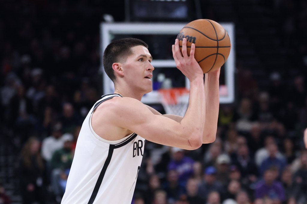Brooklyn Nets guard Egor Demin (8) shooting a three-point basket.