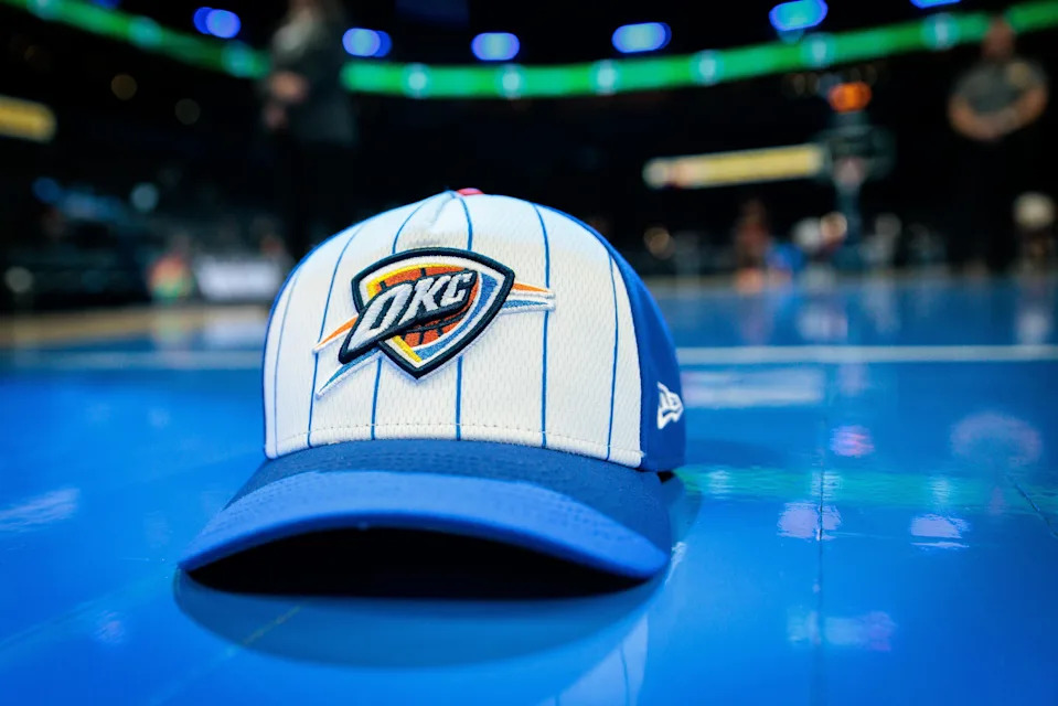 OKLAHOMA CITY, OKLAHOMA - FEBRUARY 22: An Oklahoma City Thunder hat sits courtside prior to the game against the Cleveland Cavaliers at Paycom Center on February 22, 2026 in Oklahoma City, Oklahoma. NOTE TO USER: User expressly acknowledges and agrees that, by downloading and or using this photograph, User is consenting to the terms and conditions of the Getty Images License Agreement. (Photo by William Purnell/Getty Images)