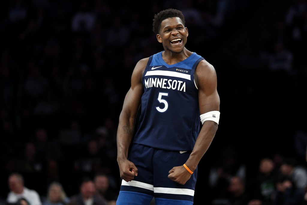 Minnesota Timberwolves guard Anthony Edwards (5) celebrates.
