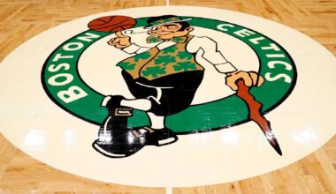 The logo of the Boston Celtics at midcourt