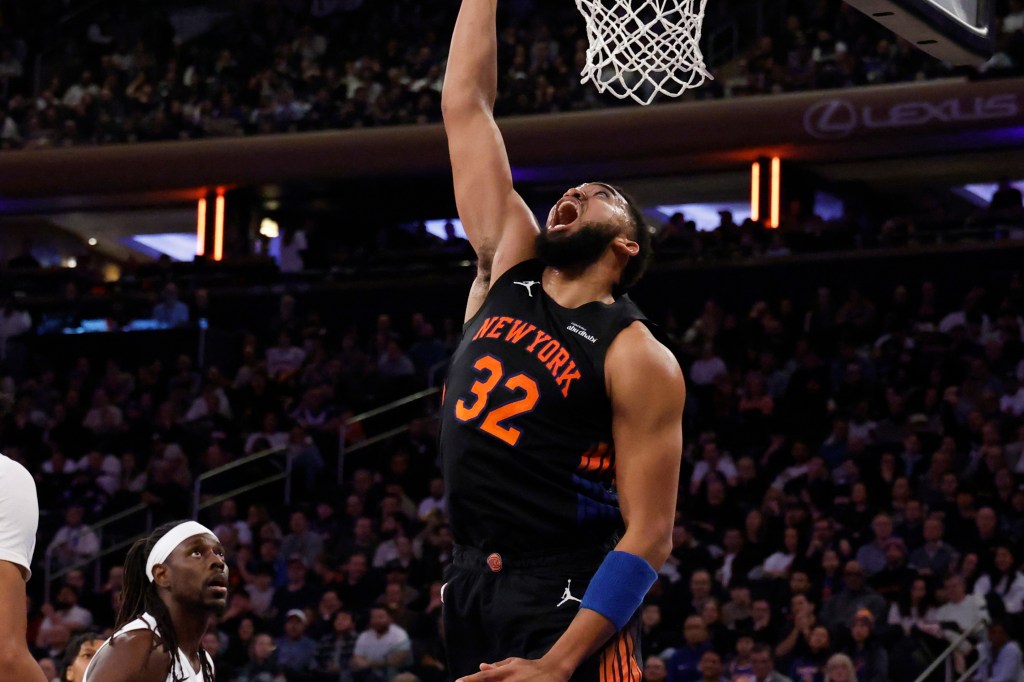 Karl-Anthony Towns #32 of the New York Knicks puts up a shot as Shaedon Sharpe #17 of the Portland Trail Blazers watches in the second half at Madison Square Garden in New York, New York, Friday, January 30, 2026.