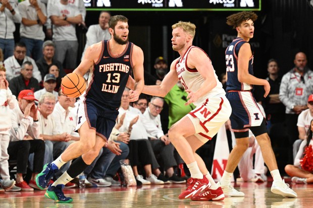 Illinois' Tomislav Ivišić dribbles against Nebraska's Rienk Mast during the first half at Pinnacle Bank Arena on Feb. 1, 2026, in Lincoln, Nebraska. (Steven Branscombe/Getty Images)