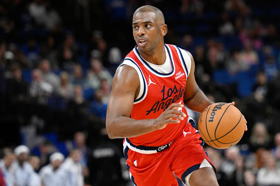 FILE - Los Angeles Clippers guard Chris Paul drives to the basket during the second half of an NBA basketball game against the Orlando Magic, Thursday, Nov. 20, 2025, in Orlando, Fla. (AP Photo/Phelan M. Ebenhack, File)