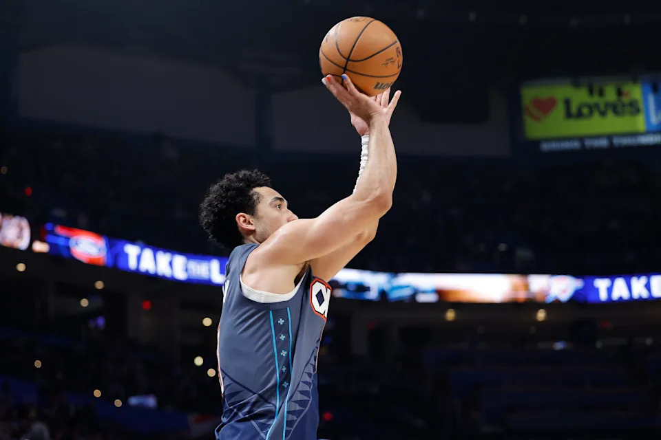 Feb 20, 2026; Oklahoma City, Oklahoma, USA; Oklahoma City Thunder guard Jared McCain (3) shoots a three point basket against the Brooklyn Nets during the second half at Paycom Center. Mandatory Credit: Alonzo Adams-Imagn Images