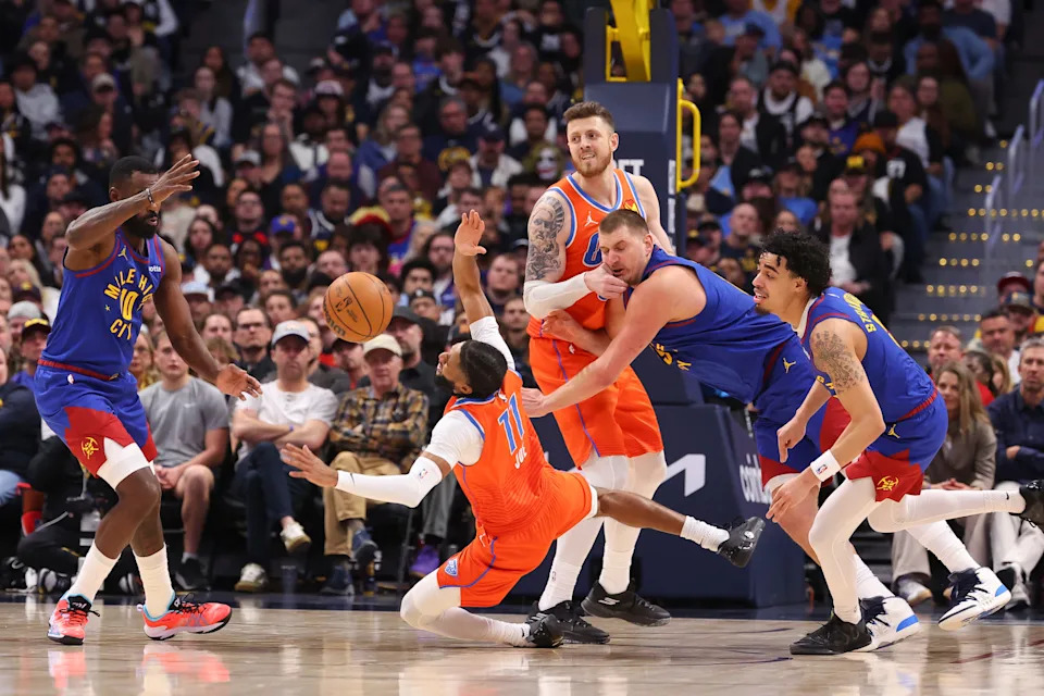 DENVER, COLORADO - FEBRUARY 01: Isaiah Joe #11 of the Oklahoma City Thunder loses the ball to the Denver Nuggets during the second quarter at Ball Arena on February 1, 2026 in Denver, Colorado. NOTE TO USER: User expressly acknowledges and agrees that, by downloading and or using this photograph, User is consenting to the terms and conditions of the Getty Images License Agreement. (Photo by Justin Tafoya/Getty Images)