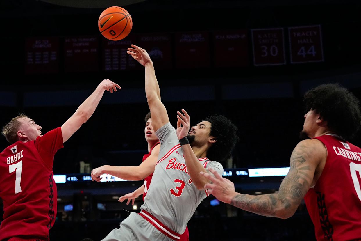 Ohio State Buckeyes guard Taison Chatman (3) shoots the ball against Wisconsin Badgers in the first half of the NCAA game at Value City Arena on Tuesday, Feb. 17, 2026 in Columbus, Ohio.