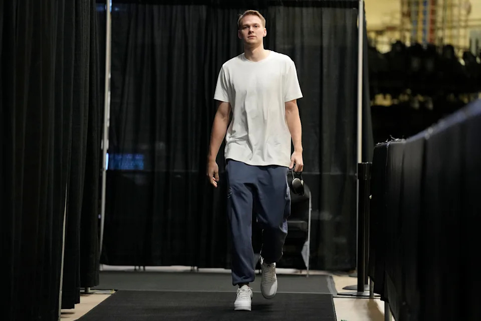 Apr 14, 2024; San Antonio, Texas, USA; Detroit Pistons guard Buddy Boeheim (35) enters Frost Bank Center before a game against the San Antonio Spurs. Mandatory Credit: Scott Wachter-USA TODAY Sports