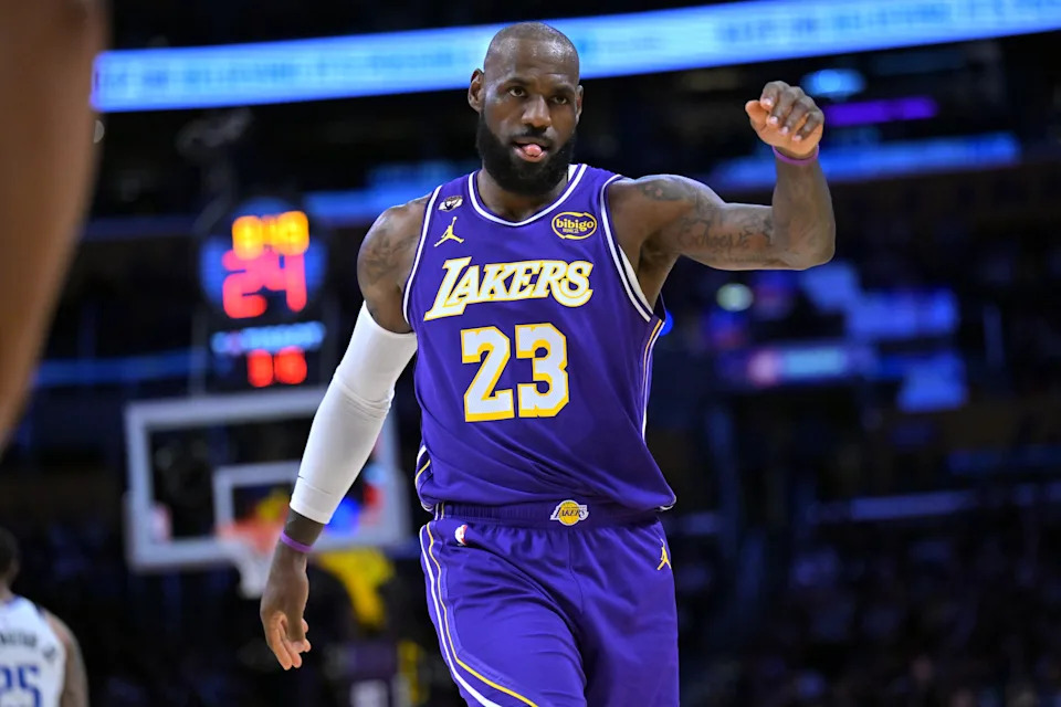 Feb 12, 2026; Los Angeles, California, USA; Los Angeles Lakers forward LeBron James (23) reacts on the court after a three-point basket in the first half against the Dallas Mavericks at Crypto.com Arena. Mandatory Credit: Jayne Kamin-Oncea-Imagn Images