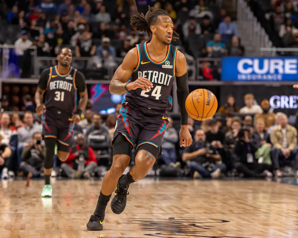 Detroit Pistons guard Daniss Jenkins (24) dribbles during a game.David Reginek-Imagn Images