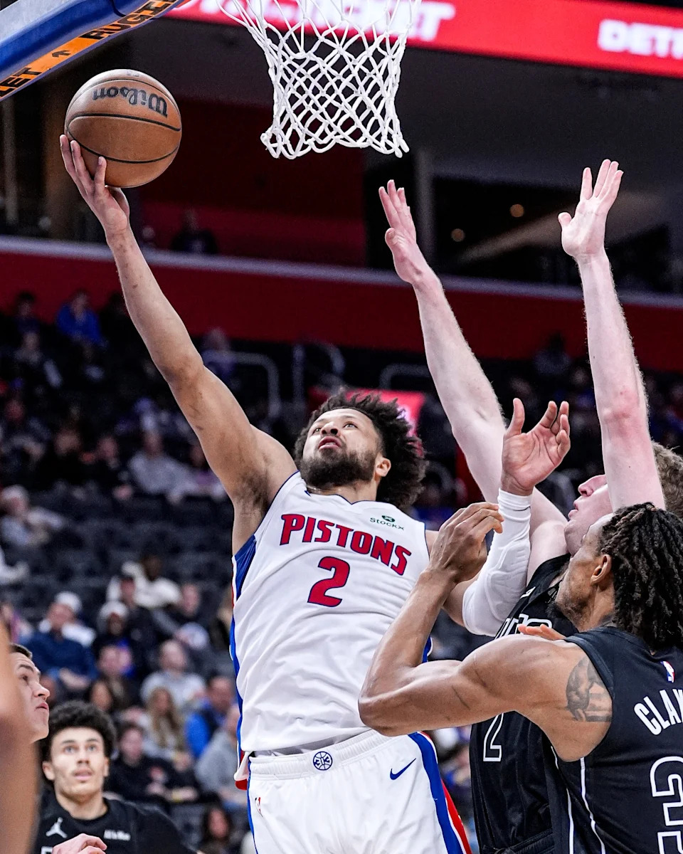 Detroit Pistons guard Cade Cunningham (2) makes a lay up against Brooklyn Nets during the first half at Little Caesars Arena in Detroit on Sunday, February 1, 2026.