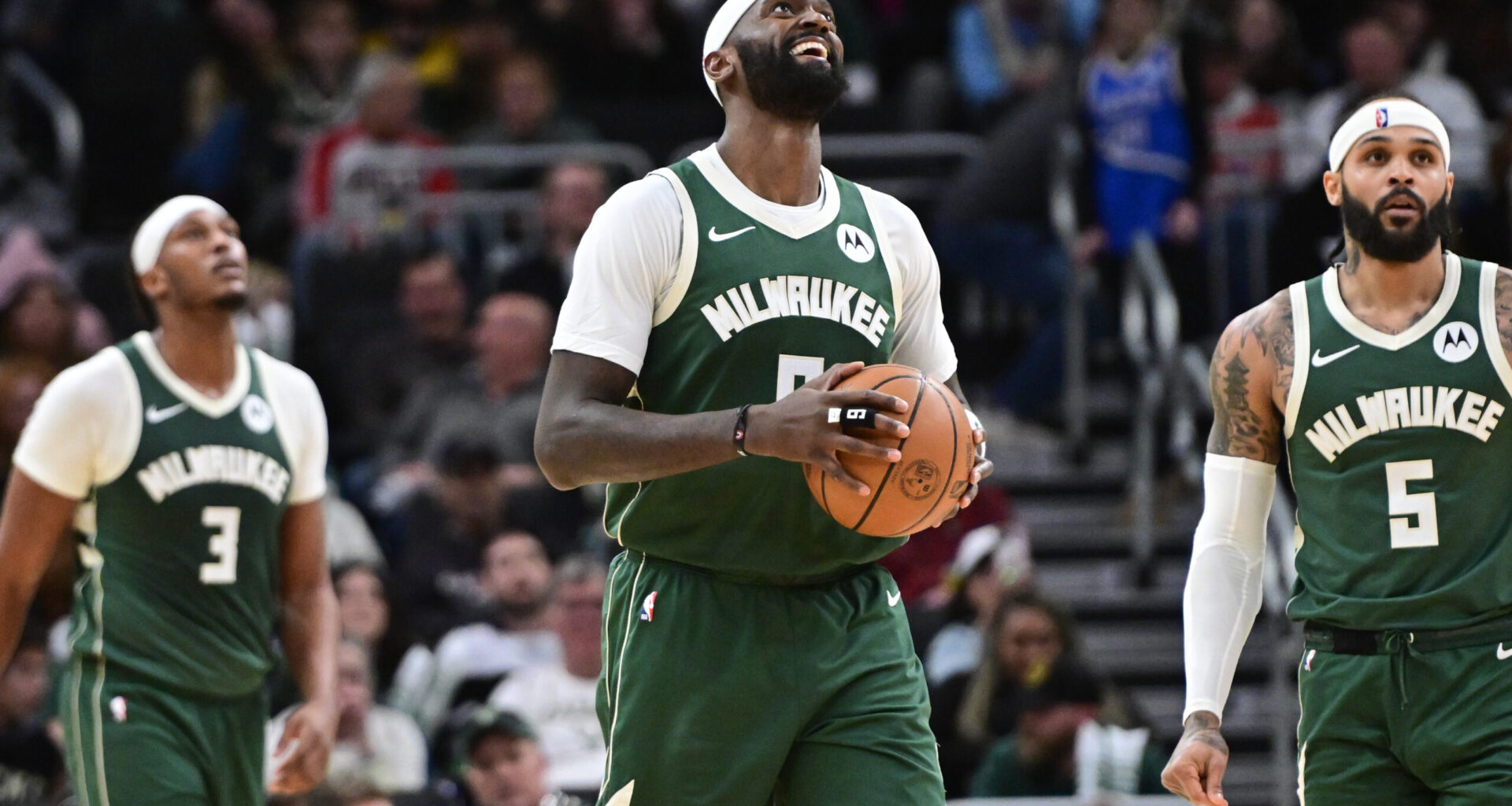 Milwaukee Bucks star shares heartwarming rock, paper, scissors game with young fan