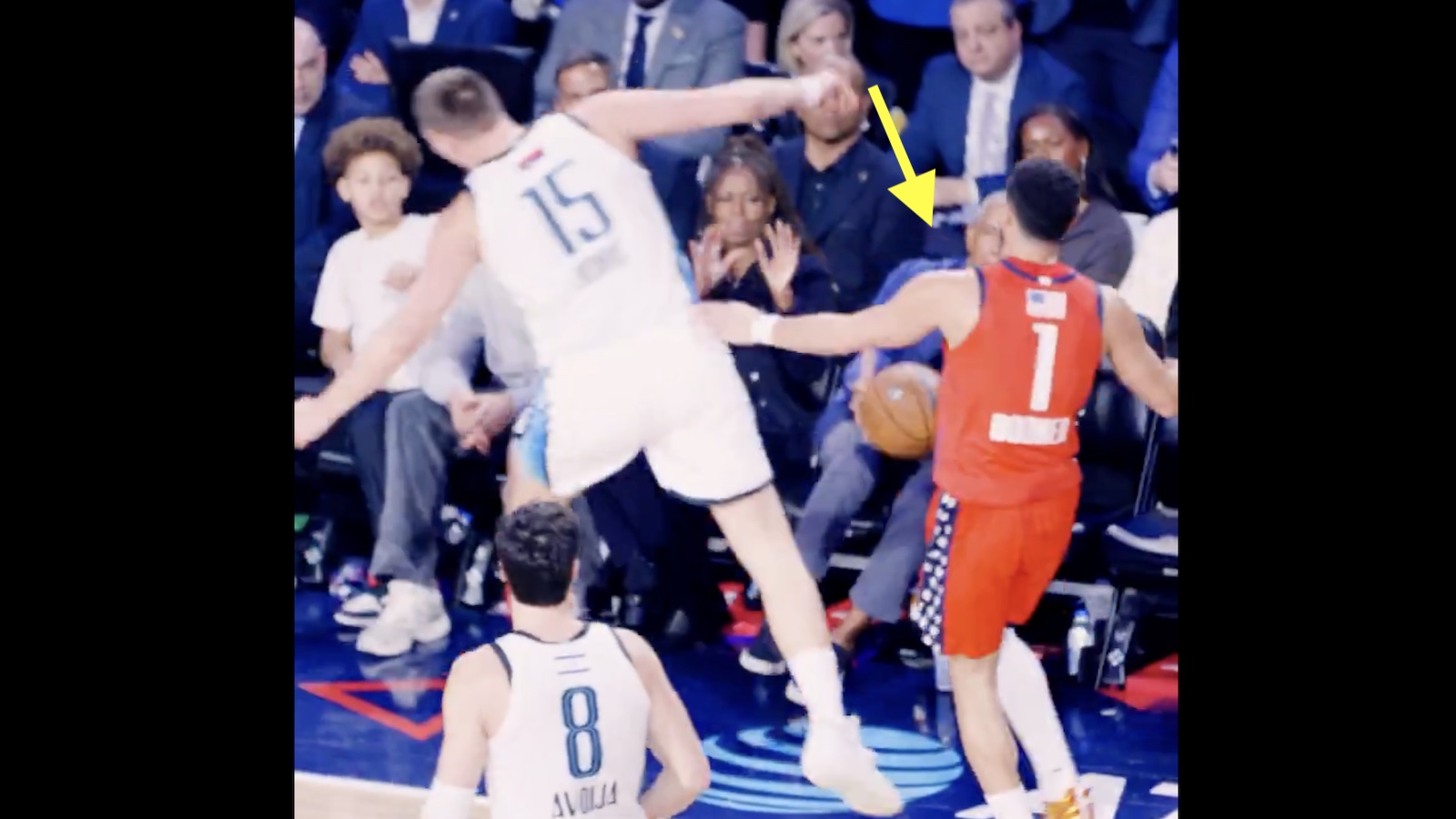 Devin Booker shoving Nikola Jokic to protect Barack Obama