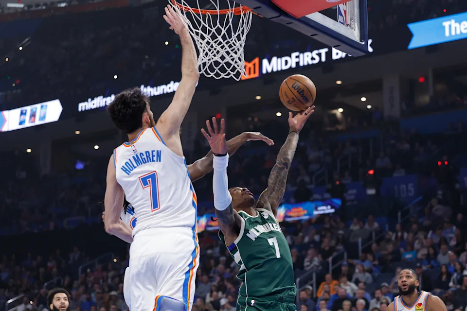 Feb 12, 2026; Oklahoma City, Oklahoma, USA; Milwaukee Bucks guard/forward Kevin Porter Jr. (7) goes up for a basket against the Oklahoma City Thunder during the first quarter at Paycom Center. Mandatory Credit: Alonzo Adams-Imagn Images