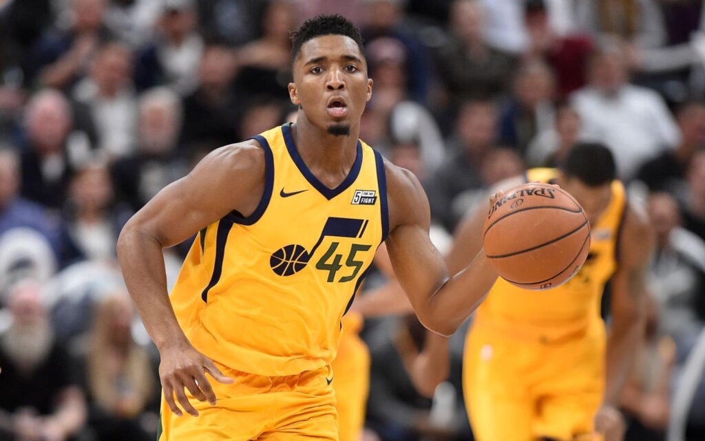 SALT LAKE CITY, UT - DECEMBER 7: Donovan Mitchell #45 of the Utah Jazz brings the ball up court during their game against the Houston Rockets at Vivint Smart Home Arena on December 7, 2017 in Salt Lake City, Utah. NOTE TO USER: User expressly acknowledges and agrees that, by downloading and or using this photograph, User is consenting to the terms and conditions of the Getty Images License Agreement. (Photo by Gene Sweeney Jr./Getty Images)