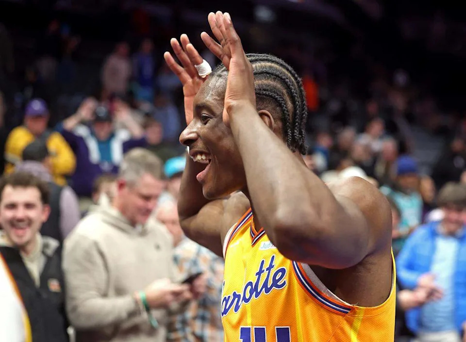 Charlotte Hornets forward/center Moussa Diabate flashes the moose horns as he exits the floor following the team’s 111-106 victory over the San Antonio Spurs at Spectrum Center in Charlotte, North Carolina, on Saturday.