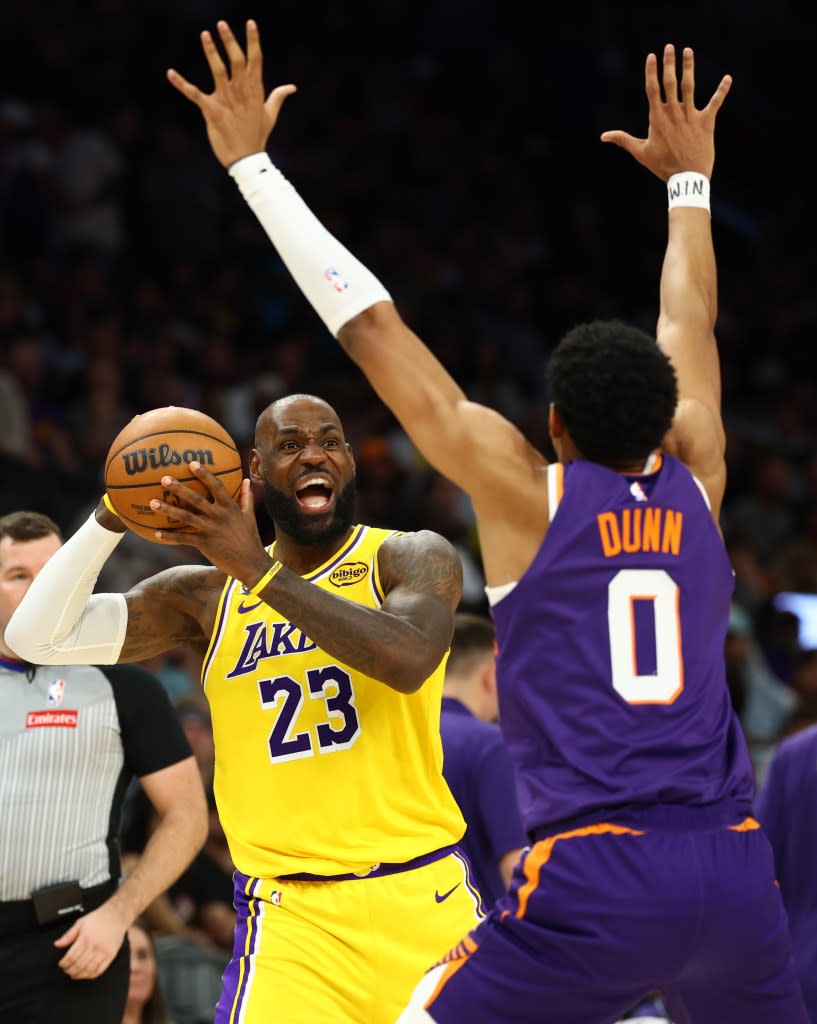 Lakers forward LeBron James looks to pass the ball against the Suns. Mandatory Credit: Mark J. Rebilas-Imagn Images Mark J. Rebilas-Imagn Images