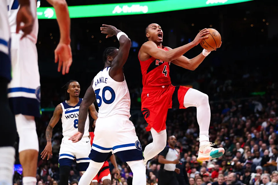 TORONTO, CANADA – FEBRUARY 4: Scottie Barnes #4 of the Toronto Raptors drives to the net against Julius Randle #30 of the Minnesota Timberwolves during the first half of their NBA game at Scotiabank Arena on February 4, 2026 in Toronto, Ontario, Canada. NOTE TO USER: User expressly acknowledges and agrees that, by downloading and/or using this Photograph, user is consenting to the terms and conditions of the Getty Images License Agreement (Photo by Cole Burston/Getty Images) | Getty Images