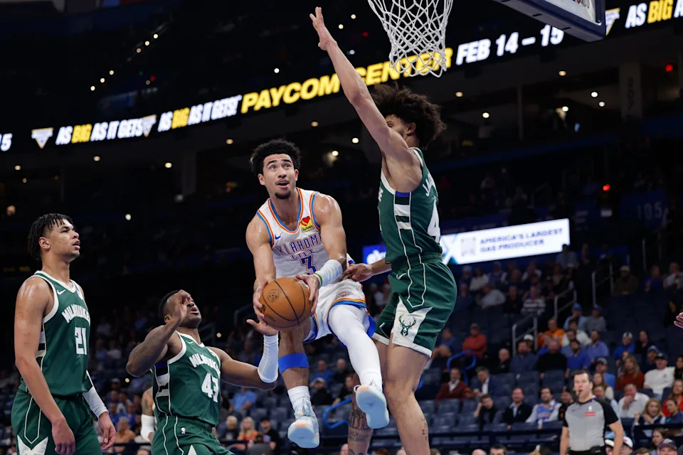 Feb 12, 2026; Oklahoma City, Oklahoma, USA; Oklahoma City Thunder guard Jared McCain (3) goes up for a basket as Milwaukee Bucks guard Andre Jackson Jr. (44) defends during the second half at Paycom Center. Mandatory Credit: Alonzo Adams-Imagn Images