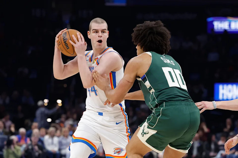 Feb 12, 2026; Oklahoma City, Oklahoma, USA; Oklahoma City Thunder guard Nikola Topić (44) moves the ball against Milwaukee Bucks center Jericho Sims (00) during the second half at Paycom Center. Mandatory Credit: Alonzo Adams-Imagn Images
