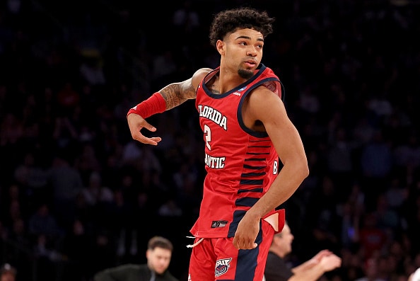  Nicholas Boyd #2 of the Florida Atlantic Owls celebrates as a time out is called in the second half against the Kansas State Wildcats in the Elite Eight round game of the NCAA Men's Basketball Tournament, showcasing the system Dusty May brought to Michigan