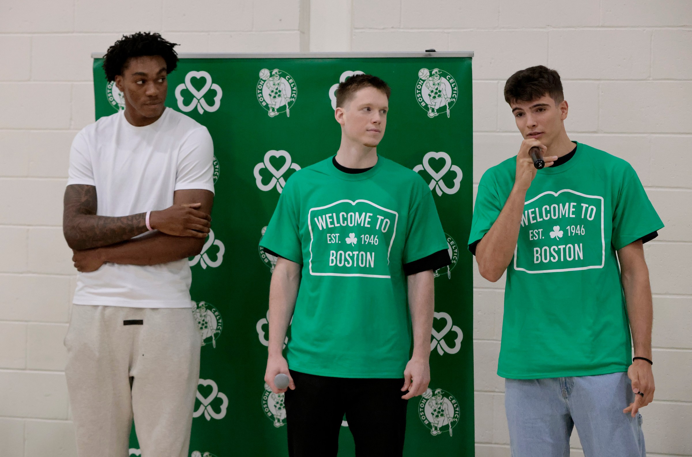 Boston, MA - July 1: Boston Celtics draft picks Amari Williams, Max Shulga, and Hugo González introduce themselves to kids at the Huntington Avenue YMCA on July 1, 2025. (Photo by Pat Greenhouse/The Boston Globe via Getty Images)