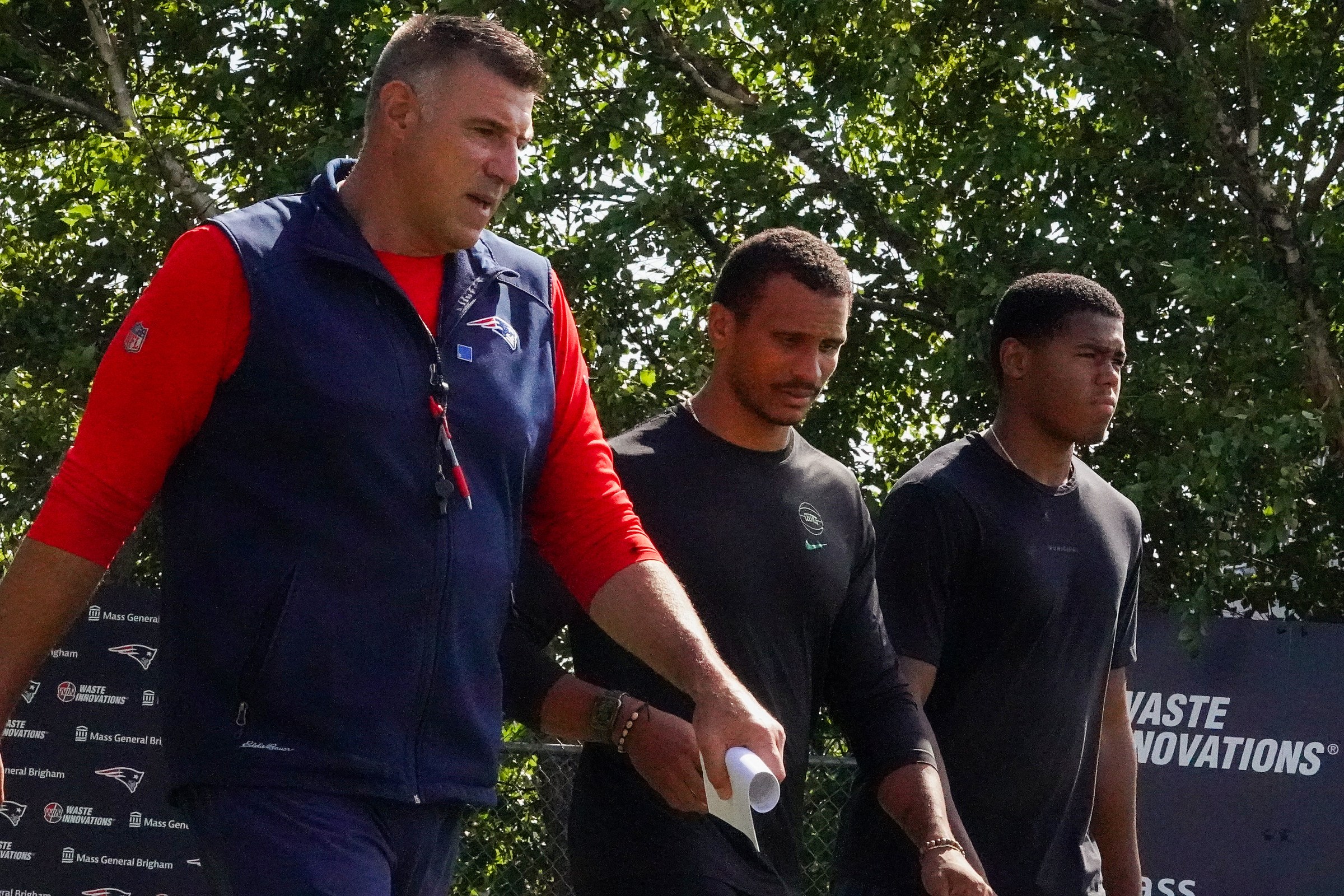 Foxborough, MA - July 30: New England Patriots head coach Mike Vrabel, Boston Celtics head coach Joe Mazzulla and Mazzulla’s stepson Michael Harden arrive for Patriots training camp at Gillette Stadium on July 30, 2025. (Photo by Barry Chin/The Boston Globe via Getty Images)