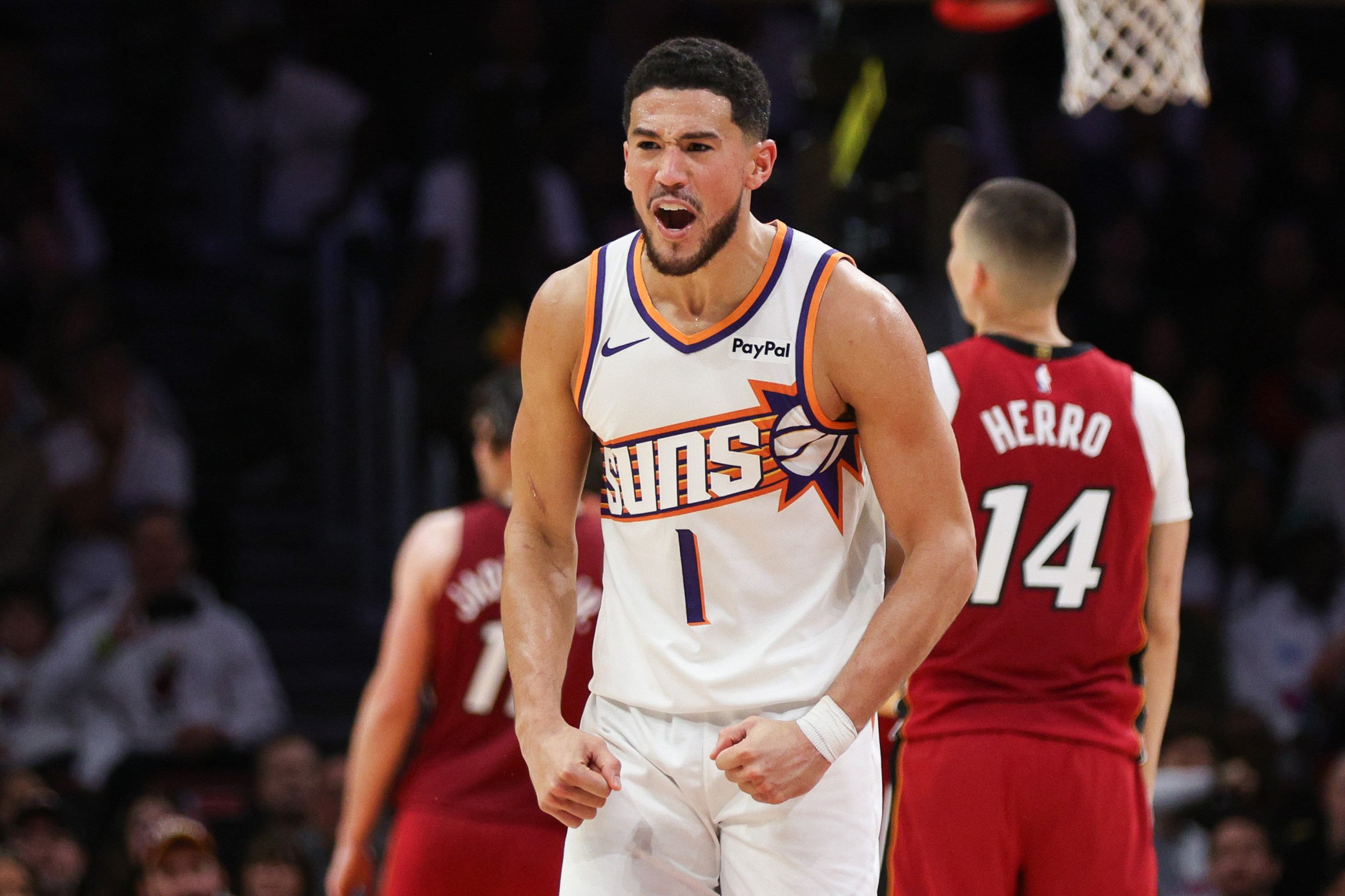 MIAMI, FLORIDA - JANUARY 13: Devin Booker #1 of the Phoenix Suns celebrates during the fourth quarter against the Miami Heat at Kaseya Center on January 13, 2026 in Miami, Florida. NOTE TO USER: User expressly acknowledges and agrees that, by downloading and or using this photograph, User is consenting to the terms and conditions of the Getty Images License Agreement. (Photo by Tomas Diniz Santos/Getty Images)