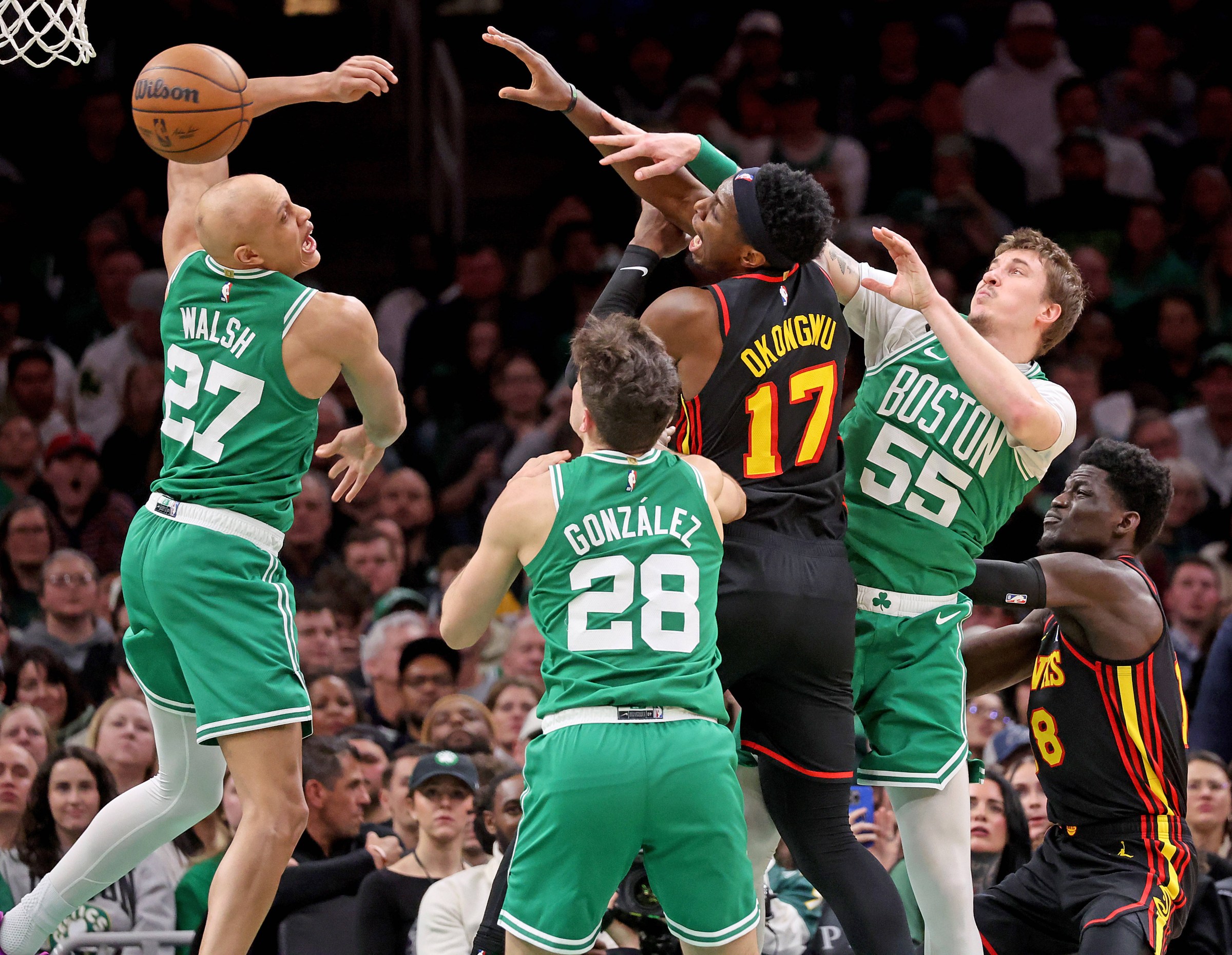 Boston, MA - January 28 - Atlanta Hawks forward Onyeka Okongwu (17) lets the ball get loose as Boston Celtics guards Jordan Walsh (27), Hugo Gonzalez (28) and Baylor Scheierman (55) surround during the second half of a NBA game at the Garden. (Photo By Matt Stone/MediaNews Group/Boston Herald via Getty Images).