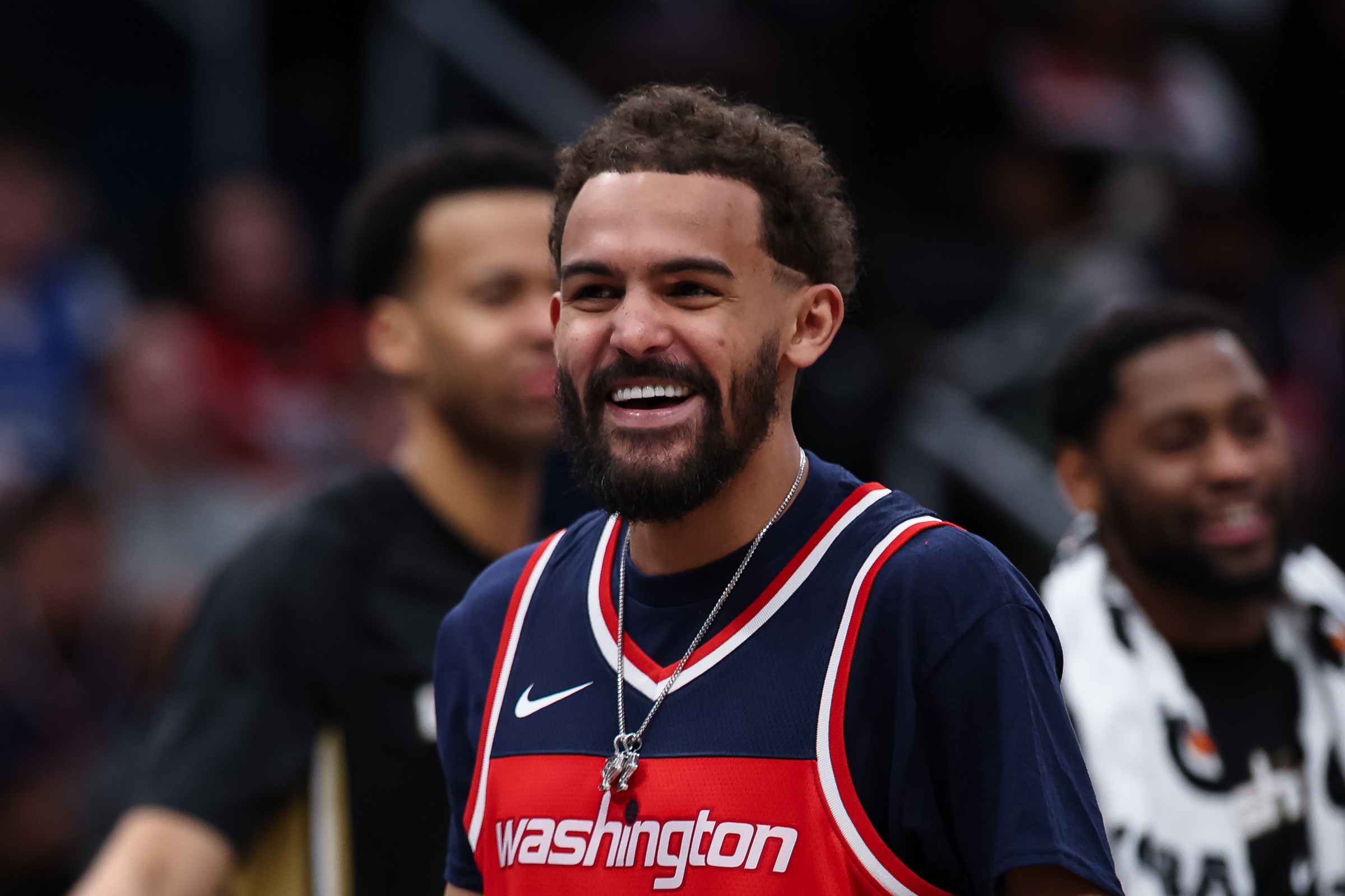WASHINGTON, DC - JANUARY 29: Trae Young #3 of the Washington Wizards laughs while wearing a John Wall jersey during the first half of the game against the Milwaukee Bucks at Capital One Arena on January 29, 2026 in Washington, DC. NOTE TO USER: User expressly acknowledges and agrees that, by downloading and or using this photograph, User is consenting to the terms and conditions of the Getty Images License Agreement. (Photo by Scott Taetsch/Getty Images)