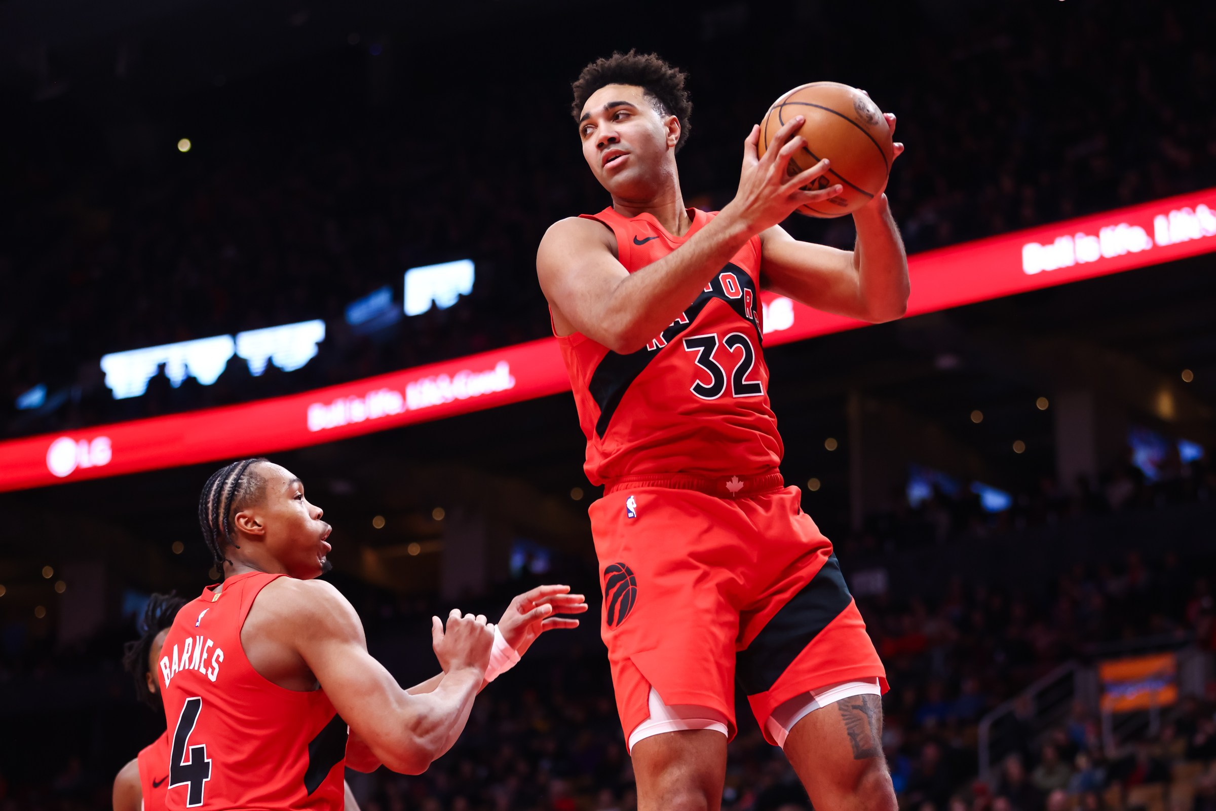 TORONTO, CANADA - FEBRUARY 8: Trayce Jackson-Davis #32 of the Toronto Raptors grabs a rebound against the Indiana Pacers during the second half of their NBA game at Scotiabank Arena on February 8, 2026 in Toronto, Canada. NOTE TO USER: User expressly acknowledges and agrees that, by downloading and/or using this Photograph, user is consenting to the terms and conditions of the Getty Images License Agreement (Photo by Cole Burston/Getty Images)