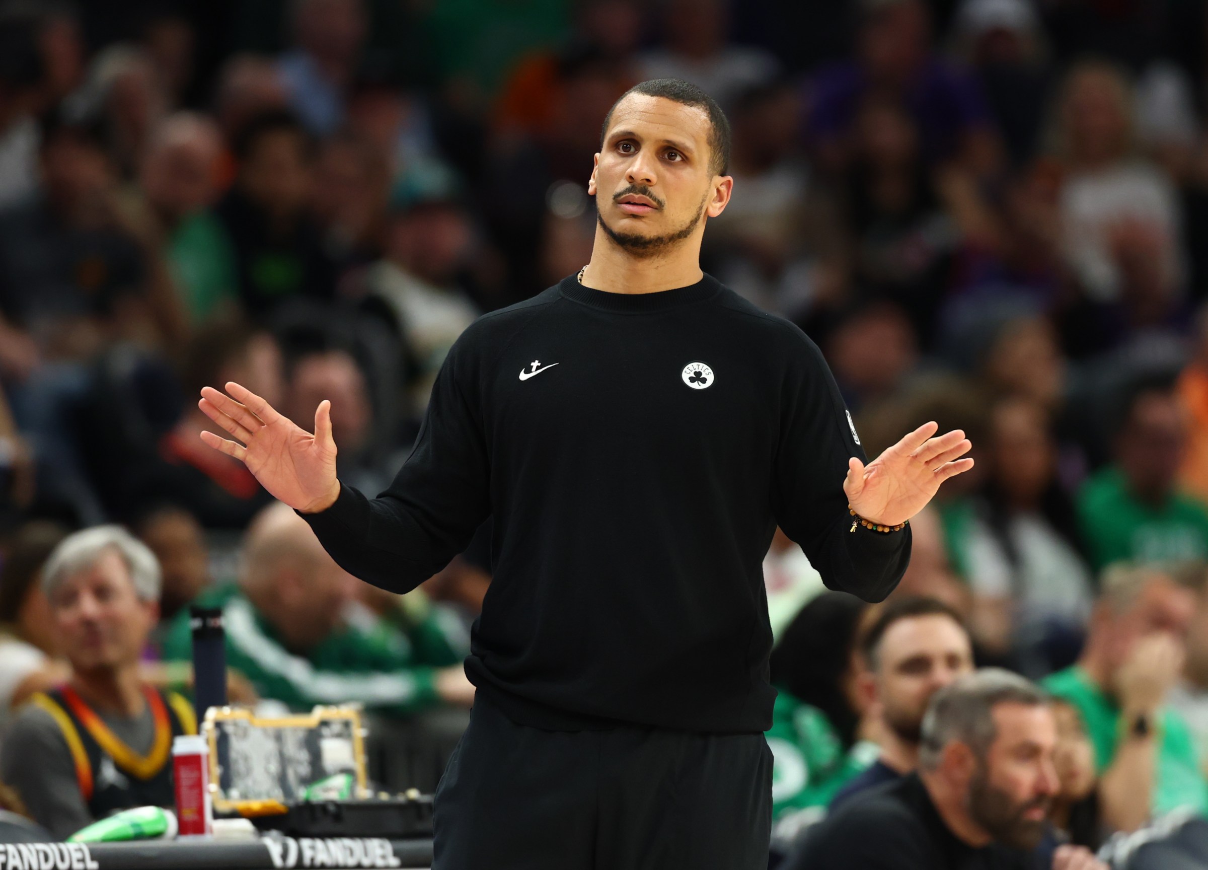 Feb 24, 2026; Phoenix, Arizona, USA; Boston Celtics head coach Joe Mazzulla reacts against the Phoenix Suns in the second half at Mortgage Matchup Center. Mandatory Credit: Mark J. Rebilas-Imagn Images