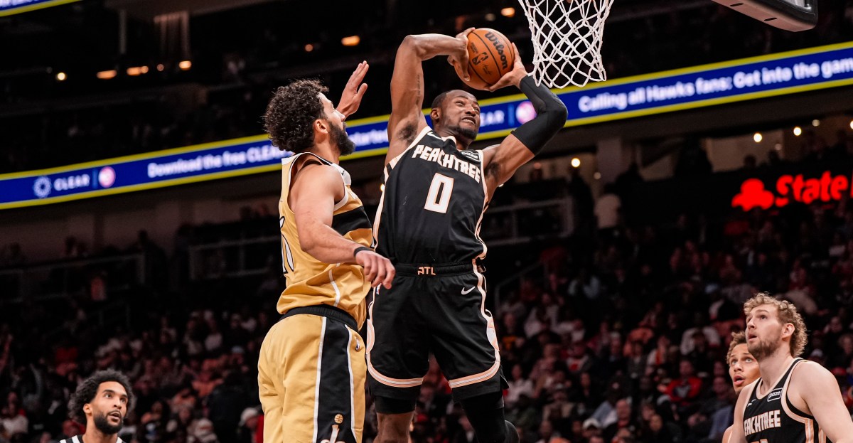 McCollum, Kispert lead way as short-handed Hawks throttle Wizards