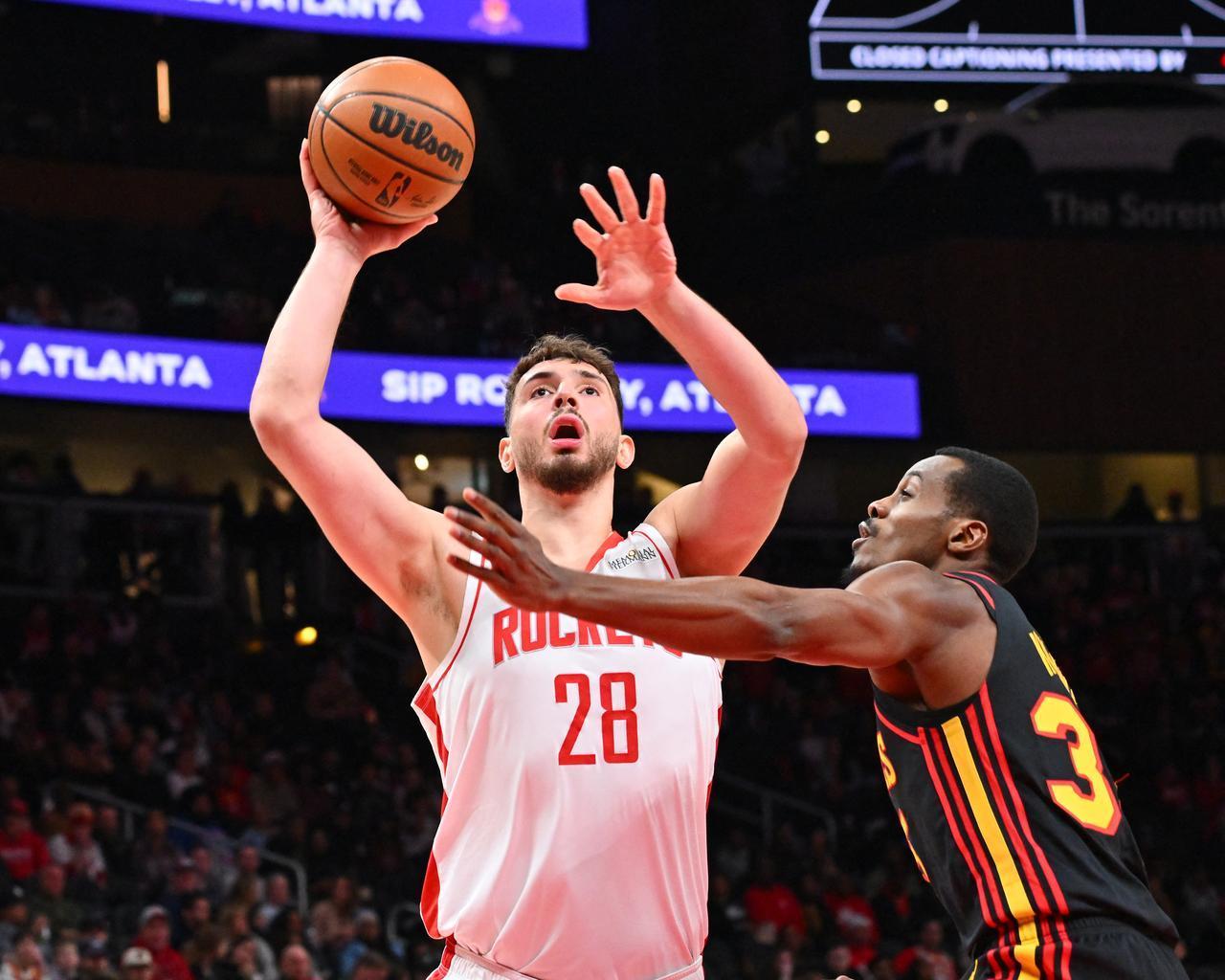 Alperen Sengun #28 of the Houston Rockets drives to the basket during the game against the Atlanta Hawks, Jan. 29, 2026 in Atlanta, Georgia. (Photo by Adam Hagy/NBAE/Getty Images/Getty Images via AFP)