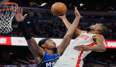 Houston Rockets forward Kevin Durant, right, goes to the basket against Orlando Magic center Wendell Carter Jr. during the second half of an NBA basketball game, Thursday, Feb. 26, 2026, in Orlando, Fla. (AP Photo/John Raoux)