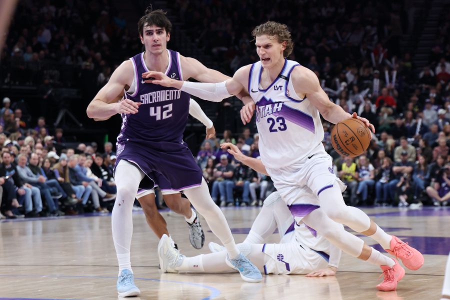 Utah Jazz forward Lauri Markkanen (23) drives to the basket against Sacramento Kings center Maxime Raynaud (42) during the second half of an NBA basketball game, Wednesday, Feb. 11, 2026, in Salt Lake City. (AP Photo/Rob Gray)