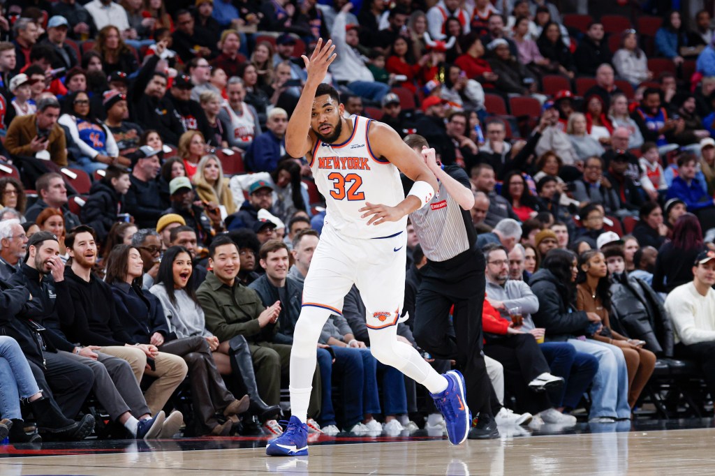 New York Knicks center Karl-Anthony Towns (32) celebrates after scoring against the Chicago Bulls.