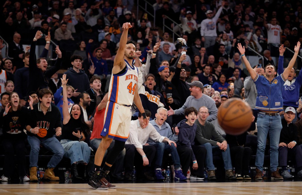 New York Knicks guard Landry Shamet sinking a three-point shot.