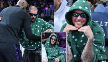 Justin Bieber cheers LeBron James courtside at Lakers game
