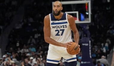 Charlotte, North Carolina, USA; Minnesota Timberwolves center Rudy Gobert (27) sets the play against the Charlotte Hornets during the second half at Spectrum Center. Mandatory Credit: Jim Dedmon-Imagn Images