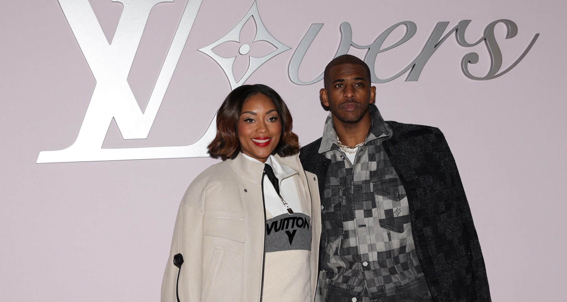 US basketball player Chris Paul (R) and his wife US fashion designer Jada Crawley pose during a photocall ahead of the Louis Vuitton Menswear Ready-to-wear Fall-Winter 2025/2026 collection as part of the Paris Fashion Week, in Paris on January 21, 2025.